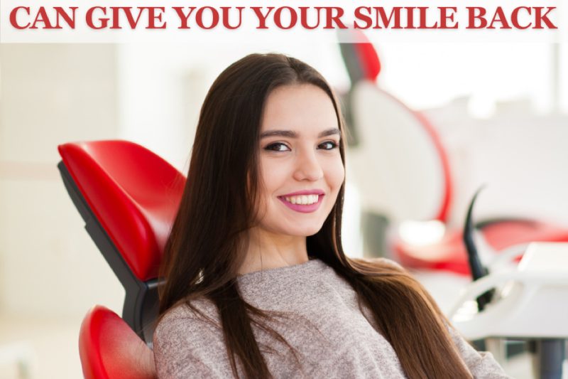 Woman smiling in a dental clinic chair.